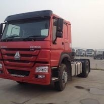सिनोट्रुक टो ट्रक हेड ट्रैक्टर ट्रक 6*4 Sx3255dt394 USD में भुगतान के लिए समर्थन